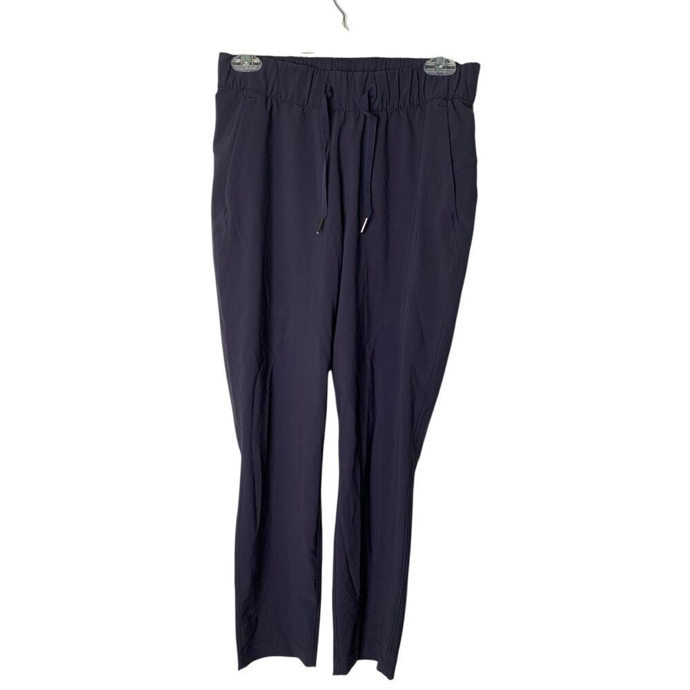Lululemon On The Fly Pant *Woven 28" women's size 4 W5AHOS